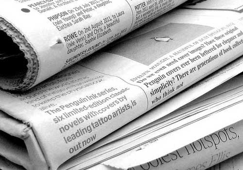 segnaposto sezione stampa d'archivio: pila di giornali